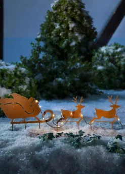 Weihnachtsmann mit Rentierschlitten